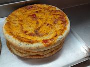 Una foto de pizza de espinaca