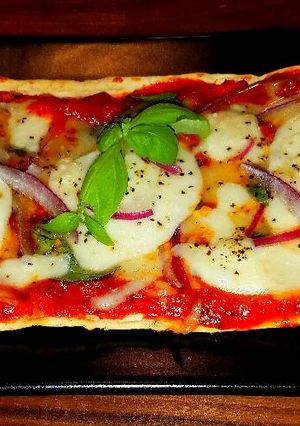A picture of Mike's 10 Minute Salt Brick Pizza Margheritas.