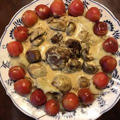 A picture of California Farm Venison with Foraged Crab Apples and Mushrooms.