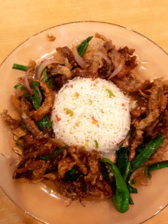 A picture of Beef chili dry with fried rice.