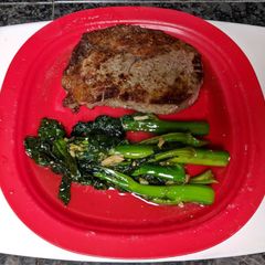 A picture of Greens with Asian Oyster Sauce.