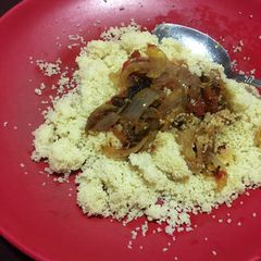 A picture of Cous-cous & sauce🍲🍚.