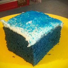 A picture of Blue Velvet Cake with Cream Cheese Frosting.