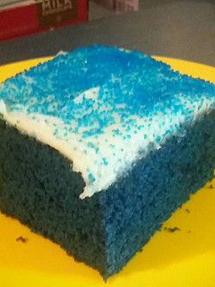 A picture of Blue Velvet Cake with Cream Cheese Frosting.