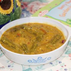 A picture of Indian Style Raw Mango & Drumsticks Dal Curry.
