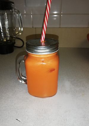 A picture of Freshly squeezed carrot and grapefruit juice.