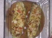 Una foto de zucchini y tomate