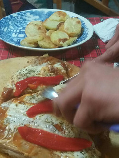 Una foto de Matambre a la Pizza con papas al horno