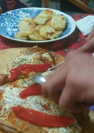 Una foto de Matambre a la Pizza con papas al horno