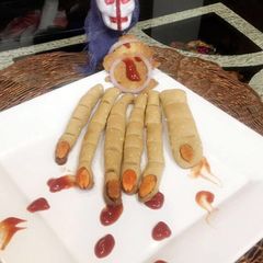 A picture of #Halloween#Whole wheat baked mathri in khooni hand shape.