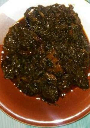A picture of Ugwu with water leaf soup.