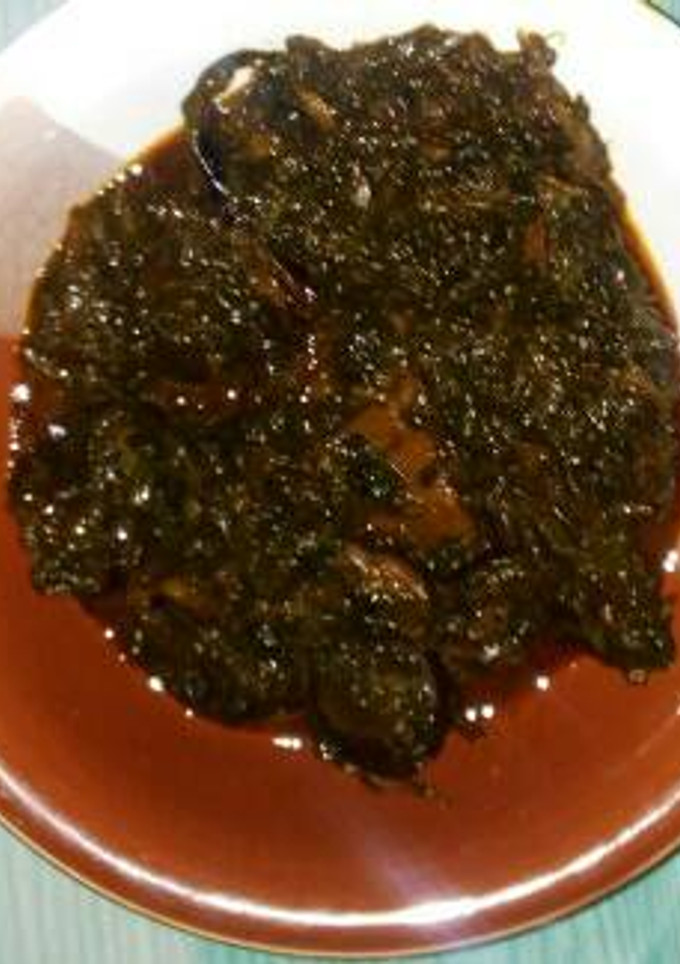 A picture of Ugwu with water leaf soup.