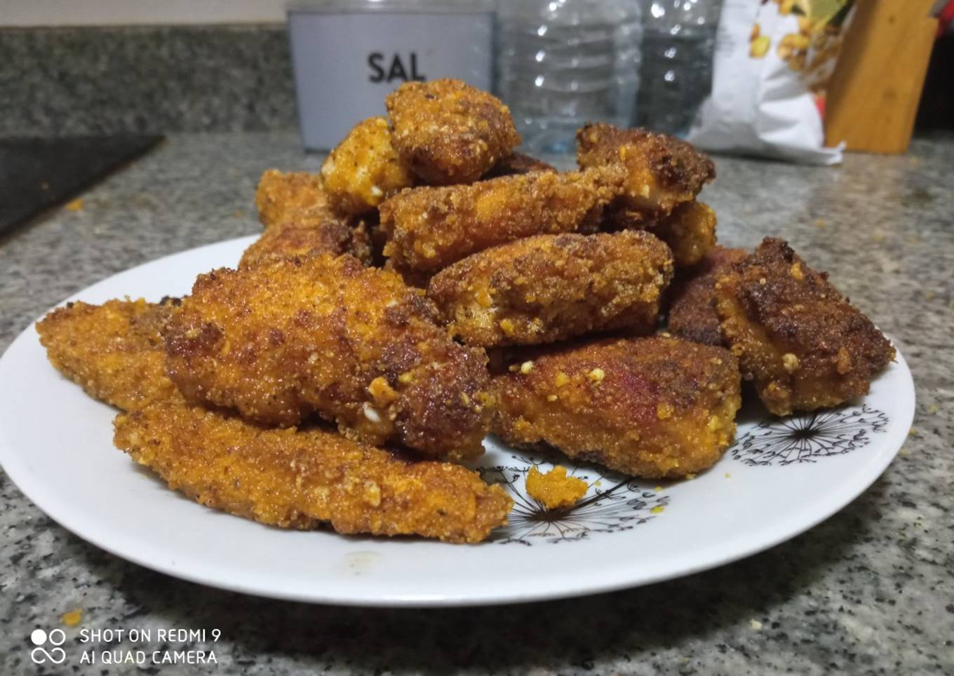 Pollo rebozado con kikos