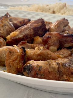 Una foto de Costillas con salsa de naranja, granada y jengibre