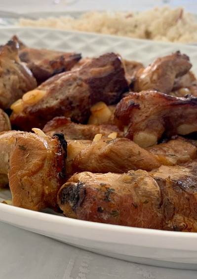 Una foto de Costillas con salsa de naranja, granada y jengibre