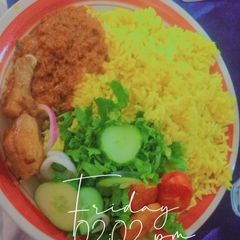 A picture of Curry rice with fried chicken in tomato sauce and slide salad.