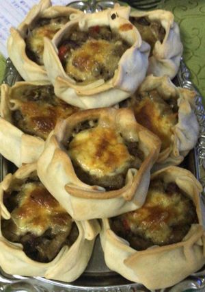 Una foto de Canastitas de berenjena y zapallitos con muzarella (Súper Fácil)