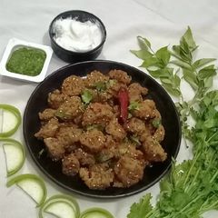 A picture of Gujarati Snack Dudhi kothmir na Muthiya (swap methi to coriander).
