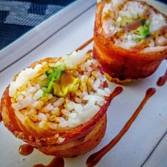 A picture of Bacon wrapped rice balls.