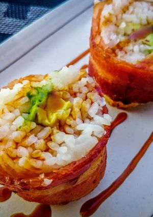 A picture of Bacon wrapped rice balls.