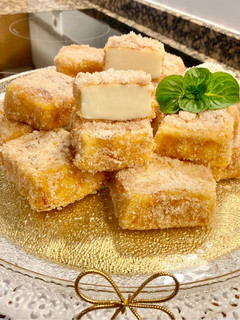 Una foto de Leche frita al aroma de naranja (Orange - scented fried milk)
