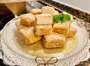 Una foto de Leche frita al aroma de naranja (Orange - scented fried milk)