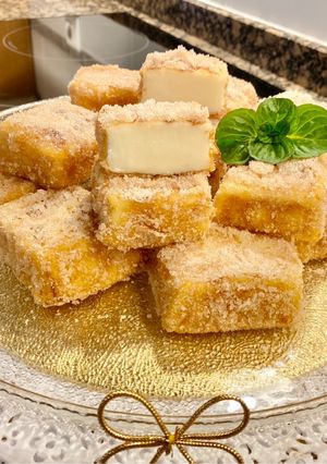 Una foto de Leche frita al aroma de naranja (Orange - scented fried milk)