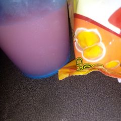 A picture of Pink guava juice 🥤with egg bites biscuits.