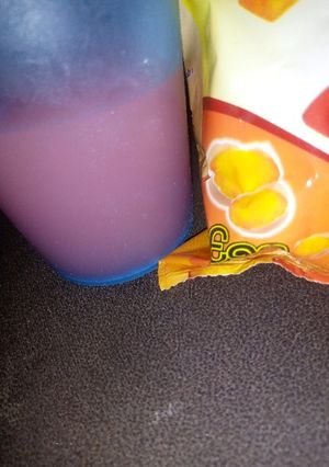 A picture of Pink guava juice 🥤with egg bites biscuits.