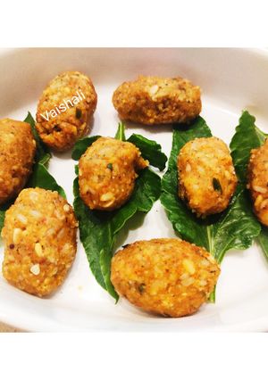 A picture of Karnataka Style Lentil Dumplings with Spinach .
