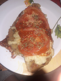 Una foto de Milanesas a la napolitana.