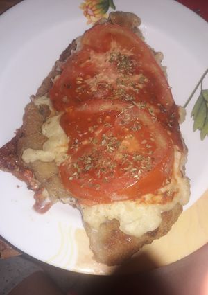 Una foto de Milanesas a la napolitana.