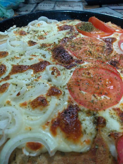 Una foto de Pizza de harina integral