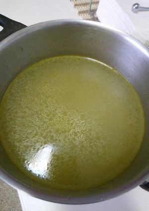 A picture of Chicken Broth in a Pressure Cooker.