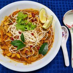 A picture of Singapore Chicken Laksa with Vegetables.