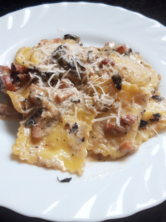 Una foto de Ravioli de queso al tartufato