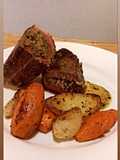 Bife de chorizo relleno con hongos y vegetales glaseados