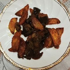 A picture of Bengan Aloo Tuk/ Wedges.
