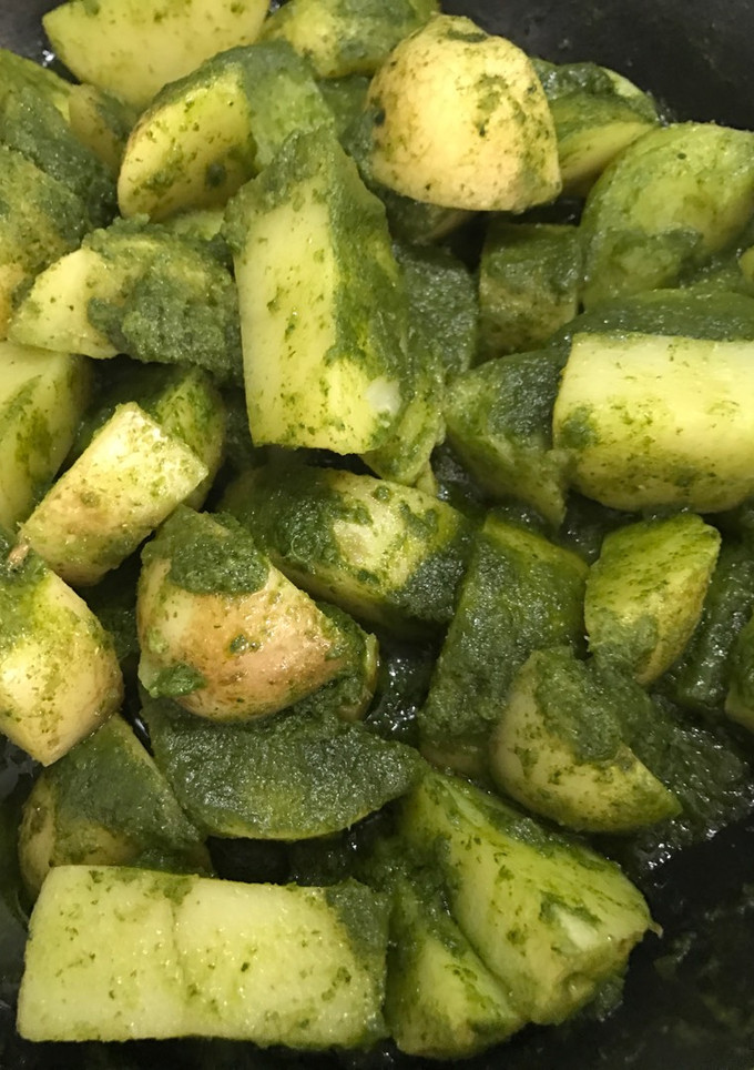 Una foto de Papas en salsa de cilantro