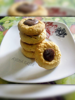 A picture of Chocolate thumbprint cookies.