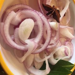 A picture of Quick red onion pickle.