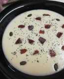 Crema de melón con jamón ibérico y semillas