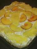 Cheesecake con ananas e pesche noci