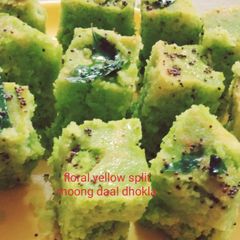 A picture of Floral yellow split moong dal dhokla.