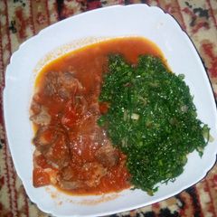A picture of Beef stew with sukuma.