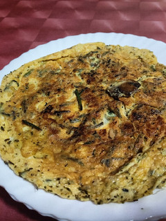 Una foto de Tortilla de champiñones y espárragos trigueros