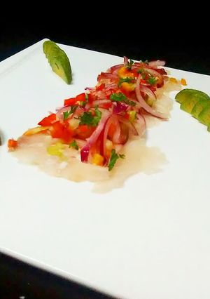 Una foto de Tiradito de pescado con mango