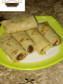 A picture of Pancake roll with sardines sauce.