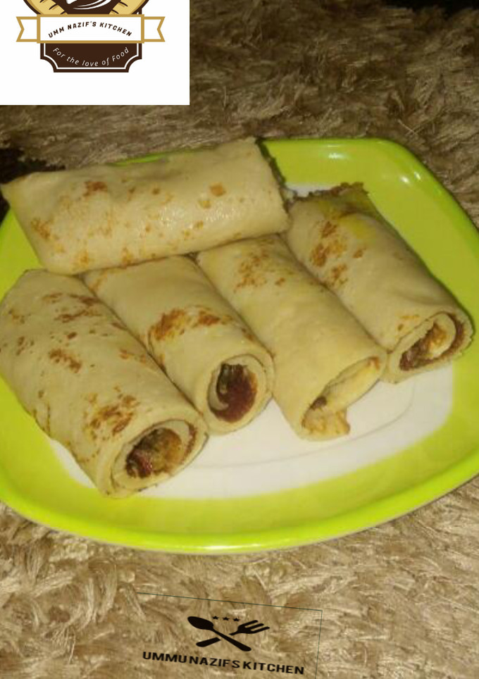 A picture of Pancake roll with sardines sauce.