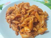 Una foto de macarrones con tomate boloñesa